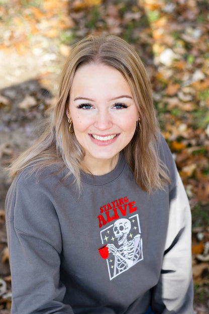 EMBROIDERED SWEATSHIRT- STAYING ALIVE COFFEE AND SKELETON